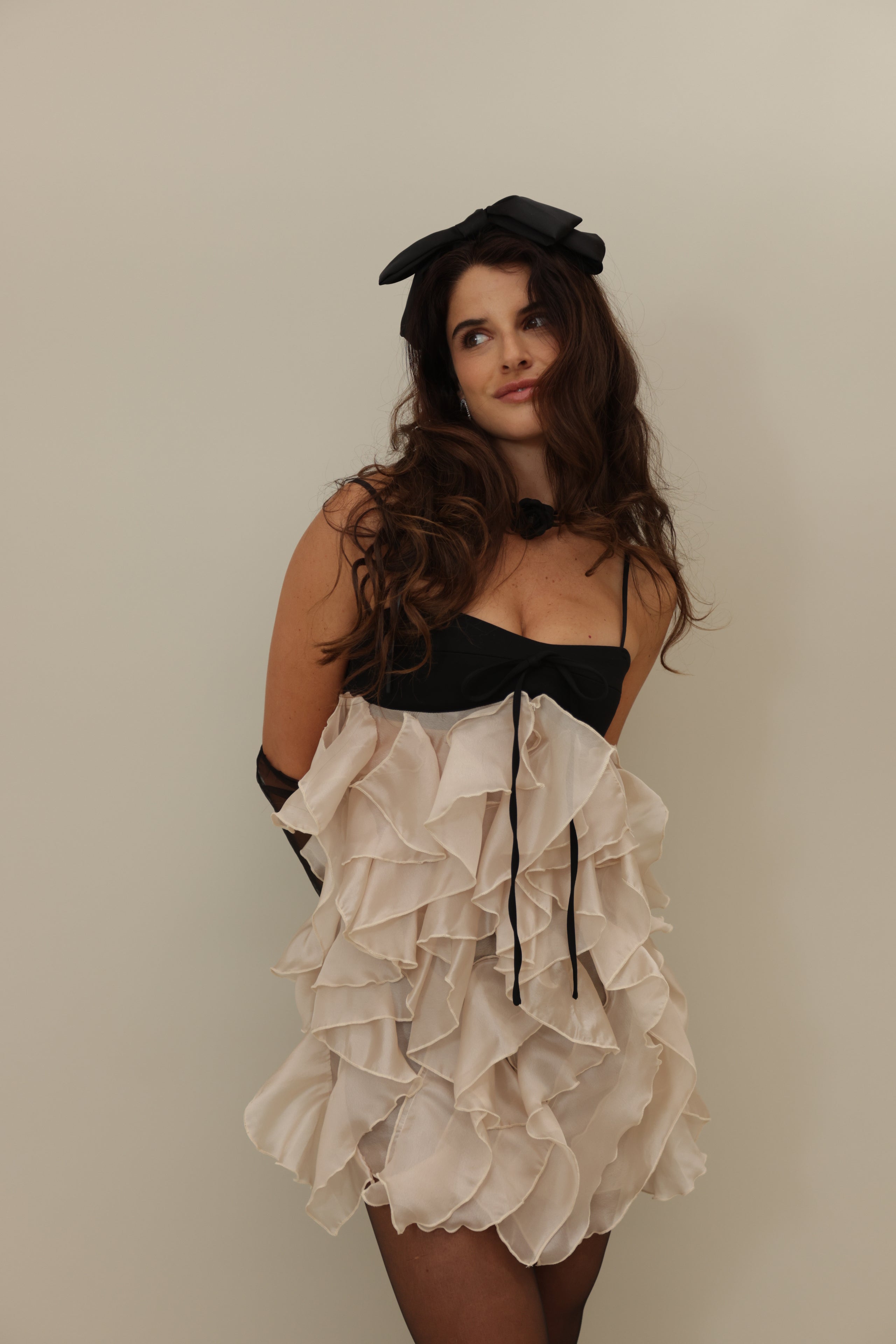 Layered Ruffle Strapless Mini Dress with Black Bow Accents