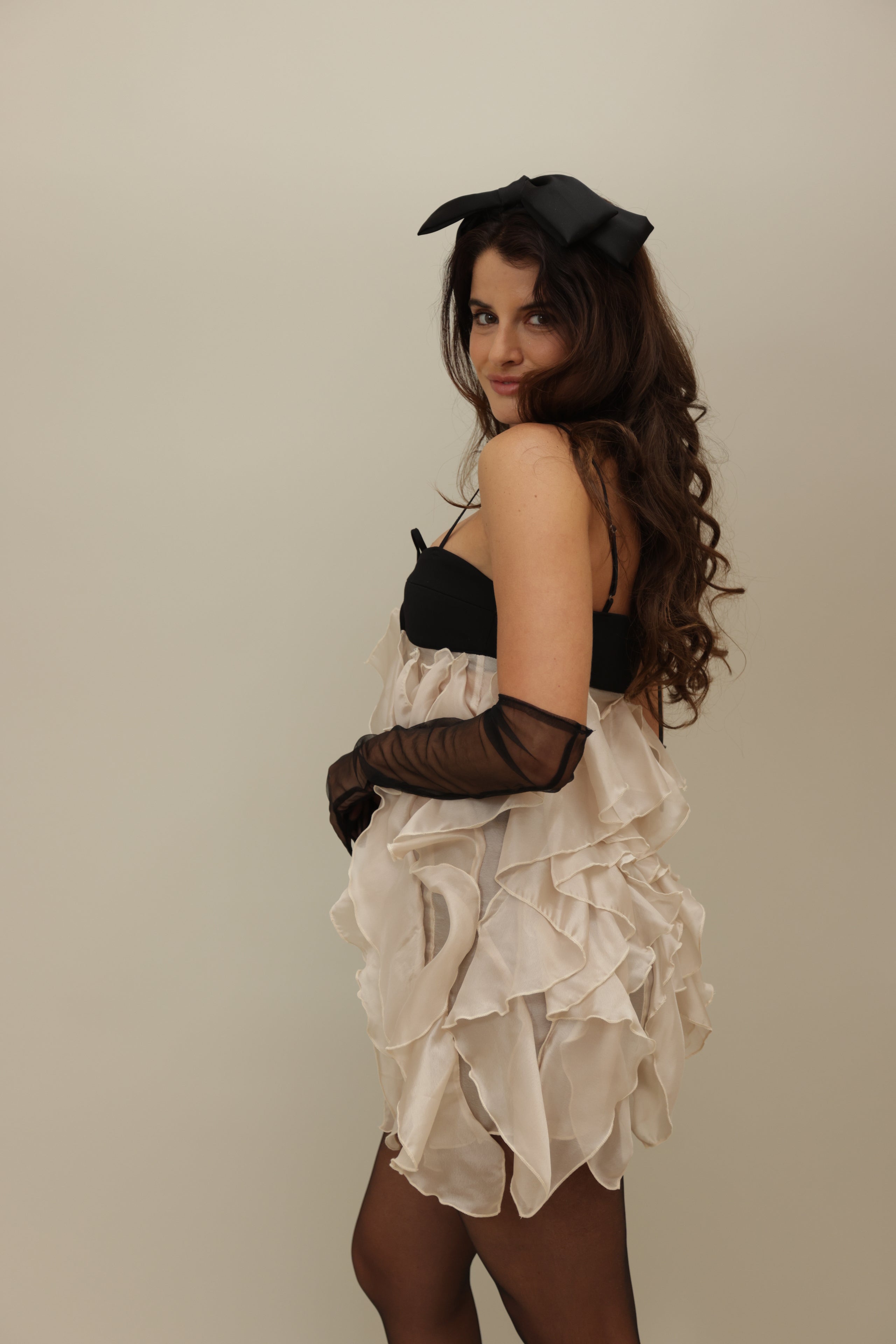Layered Ruffle Strapless Mini Dress with Black Bow Accents
