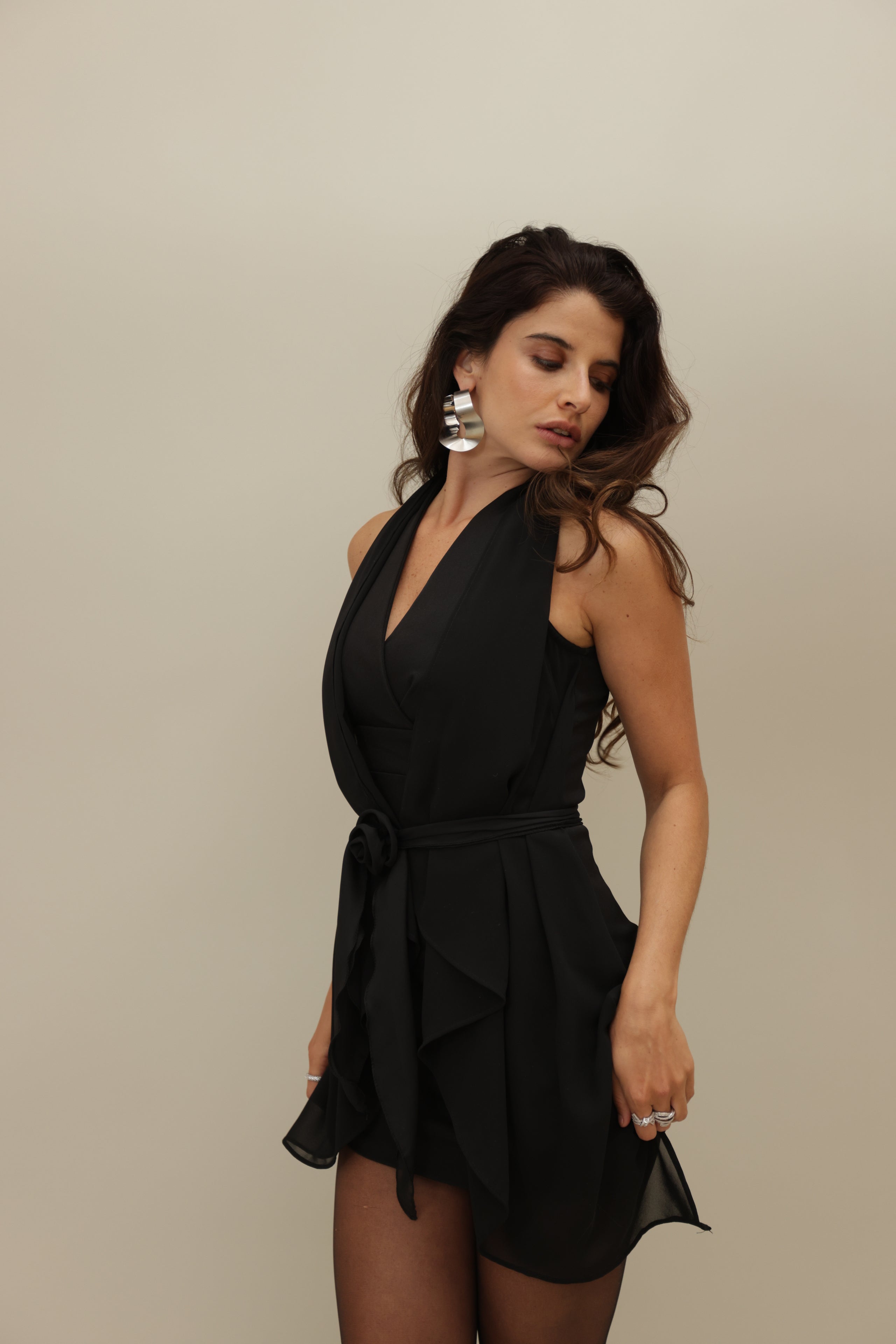 Elegant Black Draped Mini Dress with Rose Detail